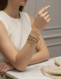 Stack of 4 Gold plated bracelets