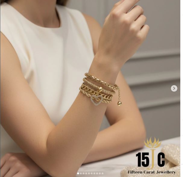 Stack of 4 Gold plated bracelets