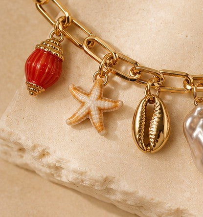 Charms bracelet with beads, pearls, hearts