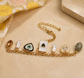 Charms bracelet with beads, pearls, hearts